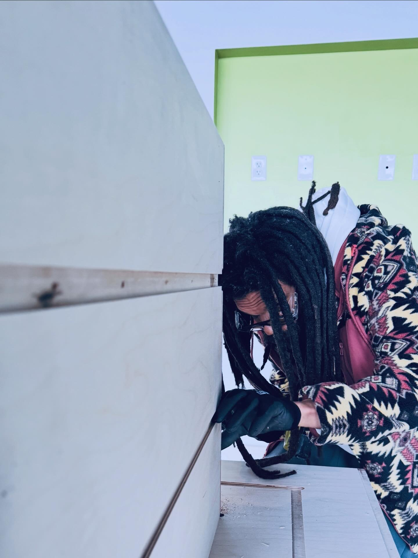 Brodrick building a Paraflex sound system cabinet